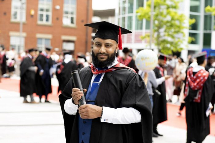 Dad-of-two proves that hard work pays off after graduating with a biology degree