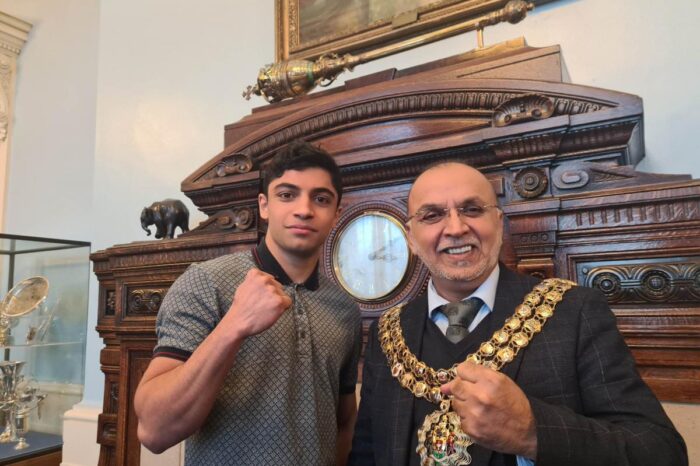 Young professional boxing star, Abdul Khan, pays a visit to the mayor of Bolton