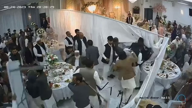Mass brawl suddenly erupts at a seemingly peaceful wedding reception in Bolton