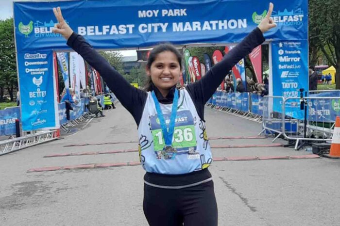 Asian Woman completes her first full marathon